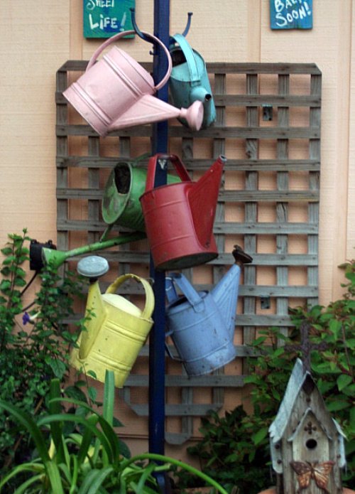 Garden Whimsies (5) A most charming collection of watering cans
