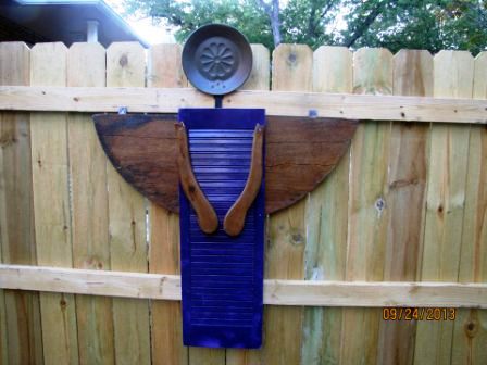 Louise Yunck Louise Yunck says, “Inspired by Myra Glandon, I finally made a garden angel. The wings are the drop leaf from a old table that had been my mom's. It was falling apart. The arms are from a rocking chair that was on in the trash. I planned to use the rockers but they were too long for my shutters. So I used the arms. I still want to add a pin of my mom's. Of course I still need a large shutter so that I can use the rockers. This piece just makes me smile.”