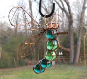 Jimmye Lynn Dye-Porter's dragonfly made from wire and marbles makes a suncatcher