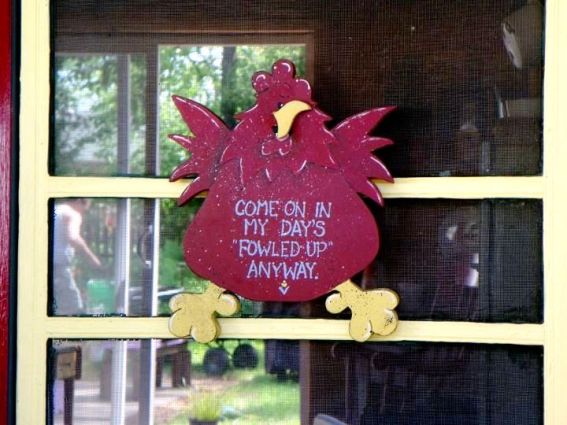 Linda Lou Miller's adorable sign was also scroll sawed and hand painted. "Come on in. My day's fowled up already!"