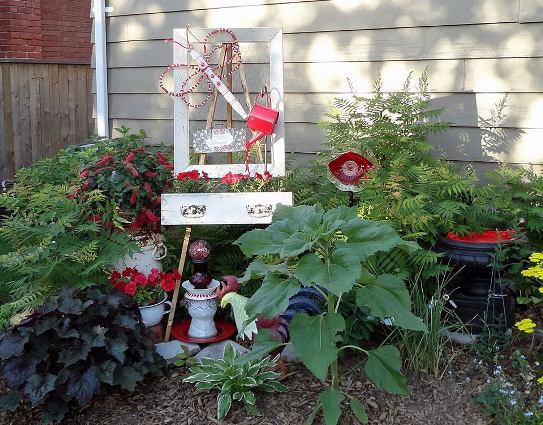 Linda Gladman's frame adds height to garden flower bed