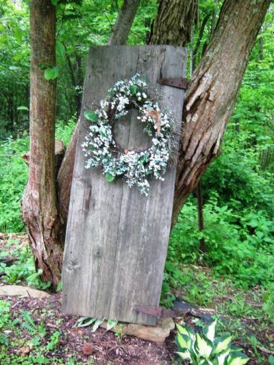 wreathed door in the forest, and my inspiration
